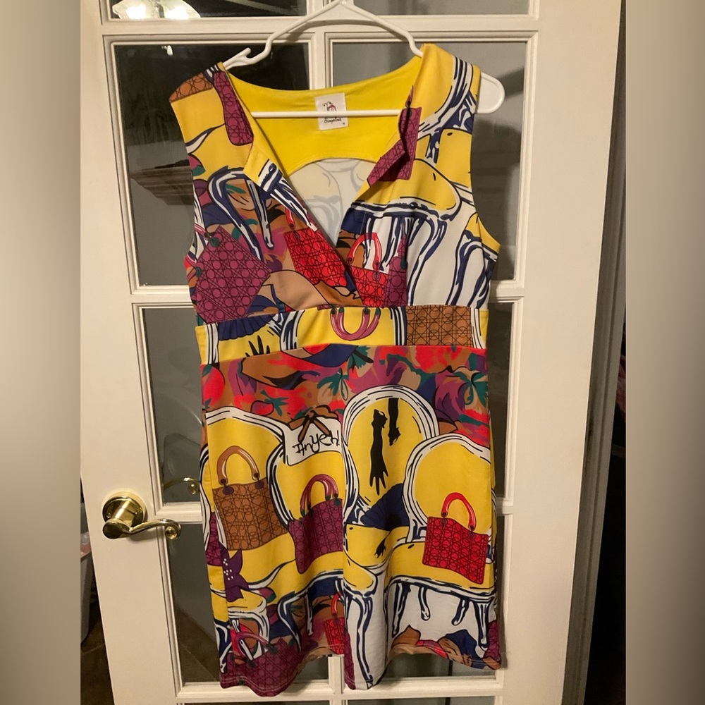 BUNGALOWS boutique dress.  Sleeveless multicolored dress in size medium. EUC